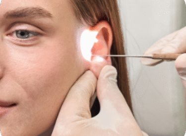 female-patient-undergoing-ear-examination-by-docto-2025-03-08-19-06-15-utc